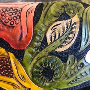 Muazari floral tooled black clutch wallet